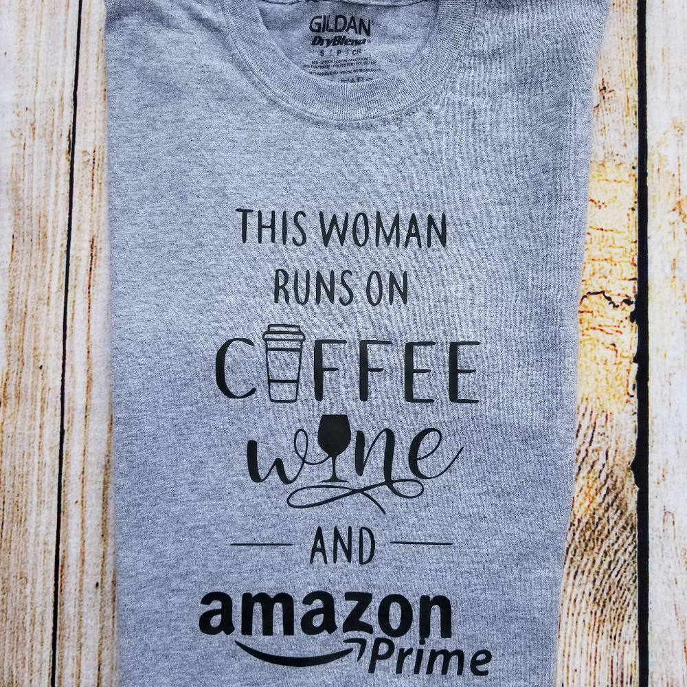 UNISEX GRAPHIC T-SHIRT RUNS ON WINE AND AMAZON